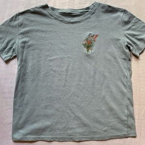 T-shirt with flower embroidery on front left
